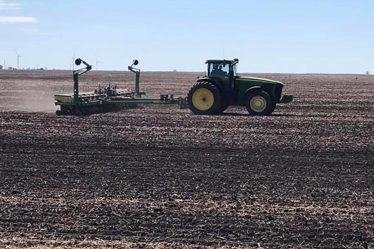 FARMERS BEGIN WORK IN THE FIELDS