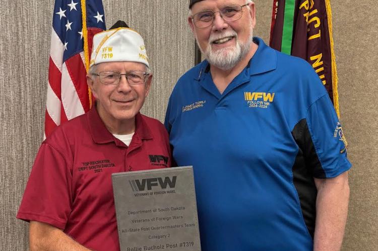 Post 7319 Quartermaster, Jerry Seiner, left received a “White Hat” from Dr. James Tuorila, National VFW Surgeon General.