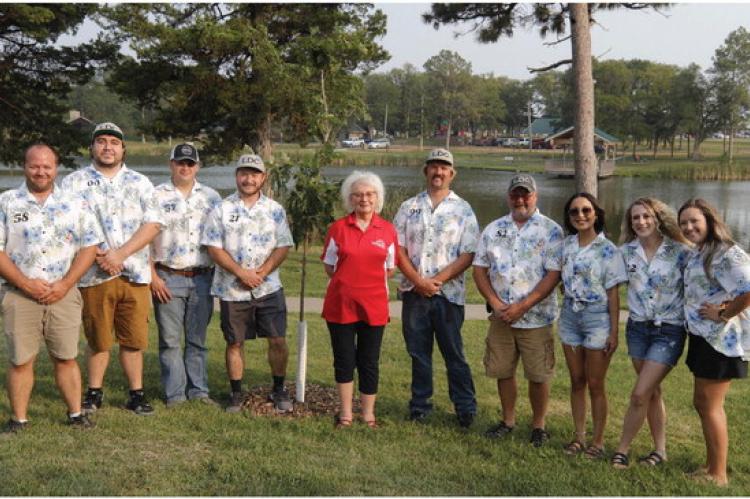 ANNUAL T TREE DEDICATION HELD IN HONOR OF PARADE MARSHALL