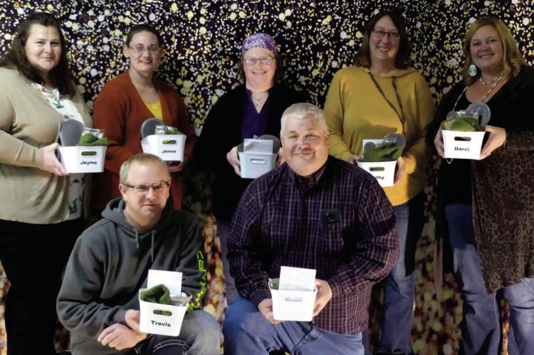Back row, from left: Jayme Bergin, Jenna Krcil, Tina Dangel, Cathy Kreeger, and Darci Bultje. Front row, from left: Travis Krcil and Mike Dangel. Courtesy Photo.