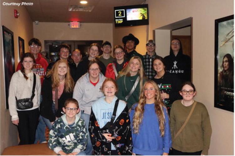 HIGH SCHOOL CHOIR STUDENTS VENTURE TO MITCHELL TO TAKE IN
