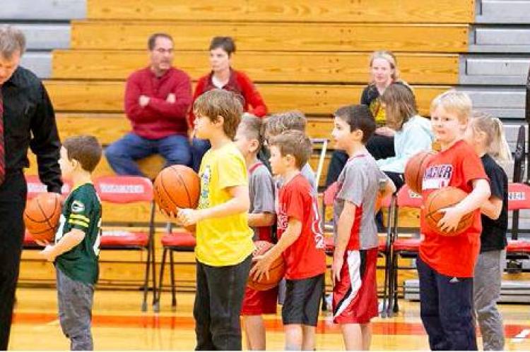 LOCAL YOUTH DISPLAY BASKETBALL SKILLS AT HALF-TIME