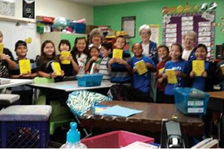 3RD GRADERS RECEIVE DICTIONARIES