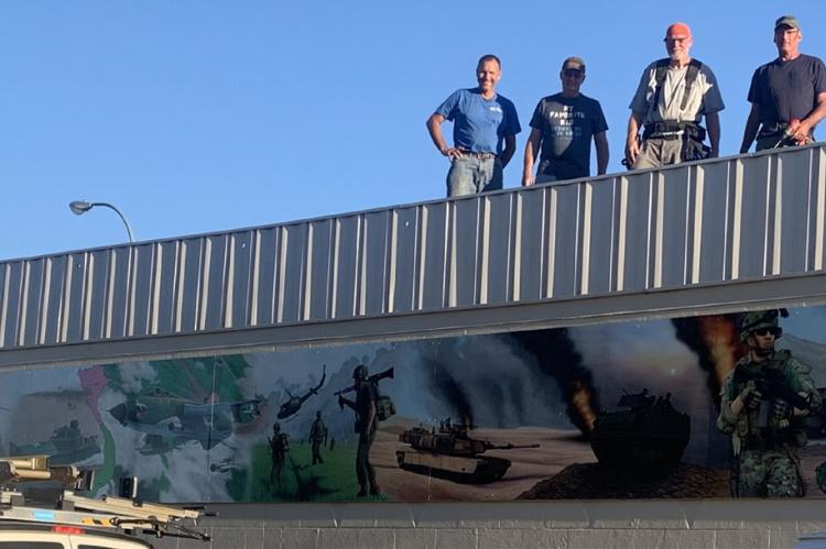 VETERAN'S MURAL LIGHTS HUNG