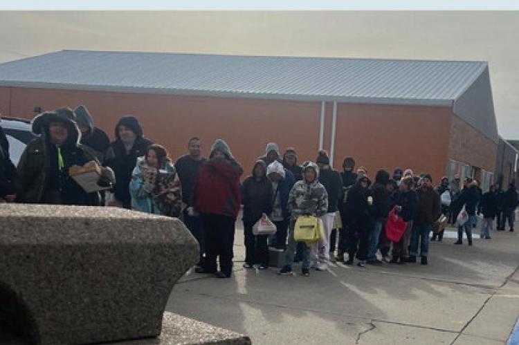 TEAM BUCHE CARES HOSTS COMMUNITY FOOD GIVEAWAY