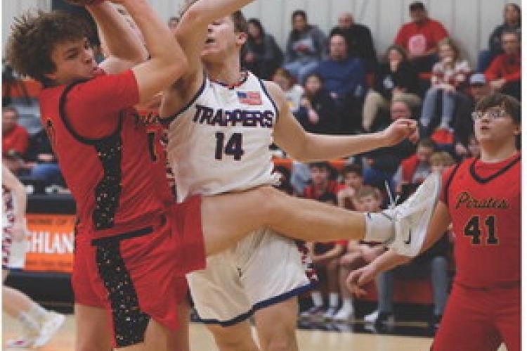 Grayson Ratzlaff with the rebound in Scotland.