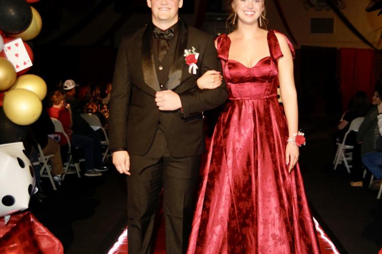 Senior Parker Petry escorting Shona Kocer. Photography by Denelle