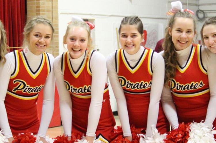 CHEERLEADERS SELLING CRUSH POPS