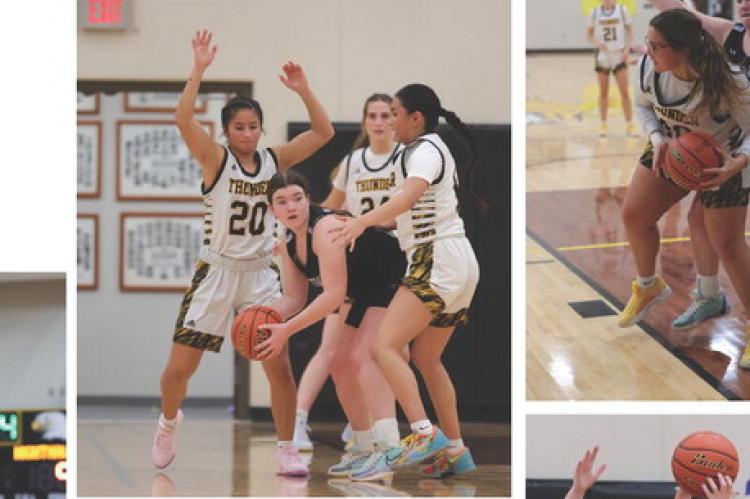 Nadia Van Zuidam and Mahpiya Irving with a strong defense.