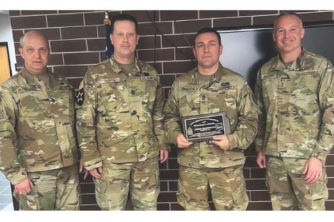 Pictured are, from left: Command Sgt. Maj. Marcus Stacey, Senior Enlisted Leader for the South Dakota National Guard, Command Sgt. Maj. Michael Martin, 153rd’s Sergeant Major, 1st Sgt. Adam Sanderson, First Sergeant of the Year 2024 award recipient, and