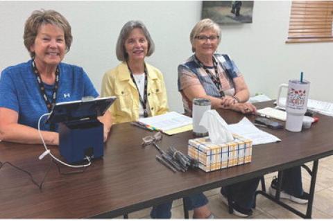 Poll workers were, from left: Vicky Roth, Carol Eggers, and Janet Wormsbecker. Photo by April Powers