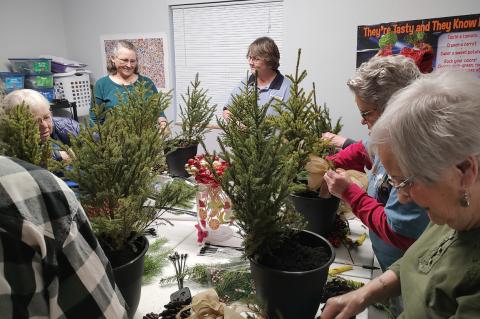 A Porch Pot Party was held at the Library Friday evening with a great group of participants eager to create their pot. Courtesy Photos