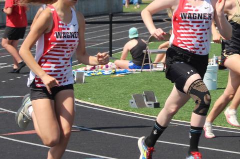 Taya Stone and Presley Slaba running the mile. Photo by Jan Martin
