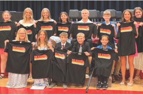 8th Grade Graduates with their 'Be Kind' t-shirts in memory of their classmate Mya Cahoy, are back row from left: Nicholas Sedillo, Jessica Hento, Rowan Brandt, Kensley DeVries, Ashley Soukup, Tucker Tjeerdsma, Zane Rush, Harper Kracht, Lydia Lane, Jasmin Totton; front: Jaelin Ratzlaff, Sydney Johnson, Palmer Podzimek, Gauge Maggs, and Bennett Vavruska. Courtesy Photo