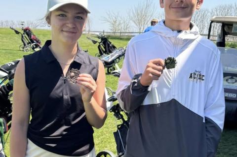 Madilyn and Lane with their 14th and 10th place medals. Courtesy Photos.