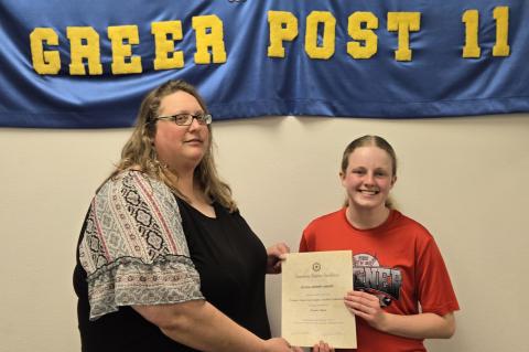 Wagner American Legion Auxiliary President Alyssa Mathis proudly presenting the Class of 2025 Wagner ALA Scholarship to Presley Slaba. Presley was also 2024's Girls State Delegate from Wagner and is a junior member of the Wagner ALA Greer Unit #11.