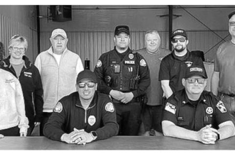 Back row, from left: Connie Kaufman, Kelly Cimpl, Mike Dufek, Officer Robert Abdo, Tracy Leines, Deputy Sergeant Tanner Vovak, Jim Beeson; front, from left: Officer Cameron Fields and Chief Deputy Derik Rolston. Courtesy Photos