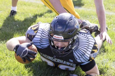  Jeff Schnabel fights for yardage after a long run