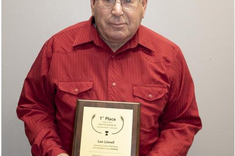 LINNELL EARNS 1ST PLACE IN NATIONAL WHEAT YIELD CONTEST