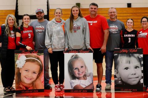 Pictured are, from left: Linsay, Brylie and Todd Link; Tera, Ashlyn and Mike Koupal; Mike, Libby and Jody Kotab. Photo by Denelle. Correction: We apologize for our mistake on the Wagner Volleyball Parents Night caption in the Post last week.