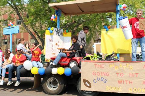 CONSTRUCTION FORCES ALTERNATE PARADE ROUTE FOR HOMECOMING PARADE