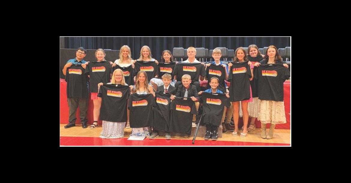 8th Grade Graduates with their 'Be Kind' t-shirts in memory of their classmate Mya Cahoy, are back row from left: Nicholas Sedillo, Jessica Hento, Rowan Brandt, Kensley DeVries, Ashley Soukup, Tucker Tjeerdsma, Zane Rush, Harper Kracht, Lydia Lane, Jasmin Totton; front: Jaelin Ratzlaff, Sydney Johnson, Palmer Podzimek, Gauge Maggs, and Bennett Vavruska. Courtesy Photo
