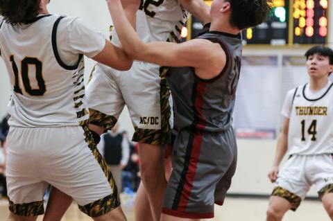 THUNDER BOYS BASKETBALL ACTION
