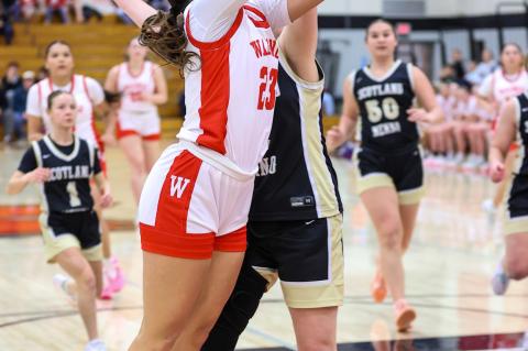 Hayden Knudsen goes up for 2 against a tough defense. Submitted by Coach Michael Koupal