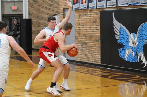Parker Petry drives to the basket.