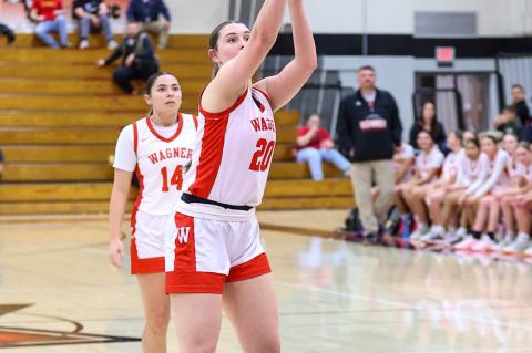 Ravyn Medricky shoots from the charity stripe. Photos by Barb Pechous