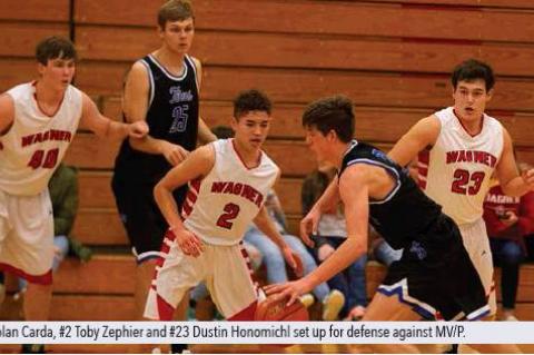 #40 Nolan Carda, #2 Toby Zephier and #23 Dustin Honomichl set up for defense against MV/P  .