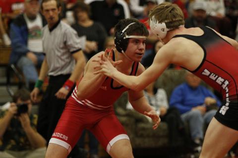 	WRESTLERS HIT THE MAT 