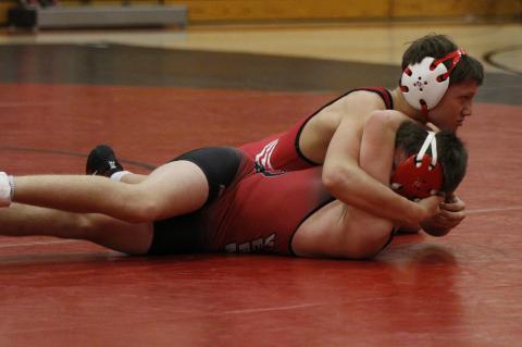 	WRESTLERS HIT THE MAT 