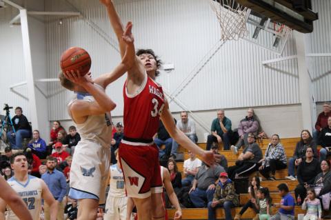 Brady Cournoyer goes up to block. Photos by Chad Lau