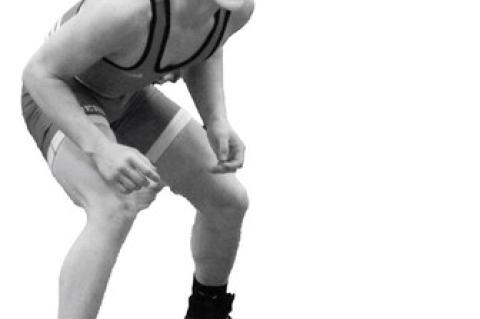 	WRESTLERS HIT THE MAT 