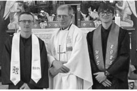 Pictured are, from left: Kahle Hill, Fr. Jim Friedrich, and Carter Smejkal. Not pictured Will Swier and Sam Blaha. Submitted by Fr. Jim Friedrich.