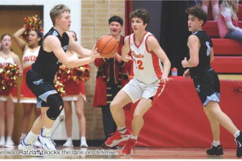 Brenson Ratzlaff blocks the lane on defense.