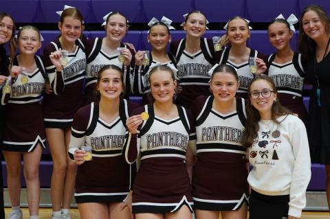 Platte-Geddes/AC/DC Cheer team members are, back row from left: Coach Danae Hunt, LaTia DeLange, Lillian Norden, Chloe Fite, Miley Timmerman, Kaylee Hucke, Jayda Van Zee, Brynn Meyerink, and Sadie Rasmussen; front row: Halle Olson, Alyssa Middendorp, Broo