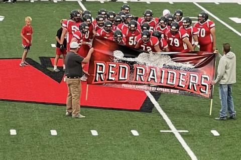 RAIDERS FALL TO TRAPPERS IN HOMECOMING GAME