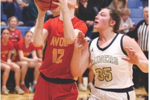 Breanna Hento goes up for 2 against the Raiders defense.