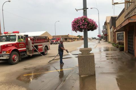 FIRE DEPARTMENT CLEANS MAIN STREET