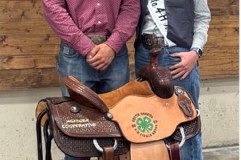 Treyvan Talsma with the Sr. Boys All Around Saddle and 4H Ambassador Oakley Reis Elwood of Chamberlain. Courtesy Photo