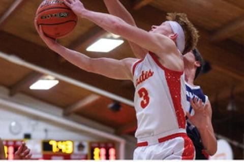 Cale Cooper goes up for two points.