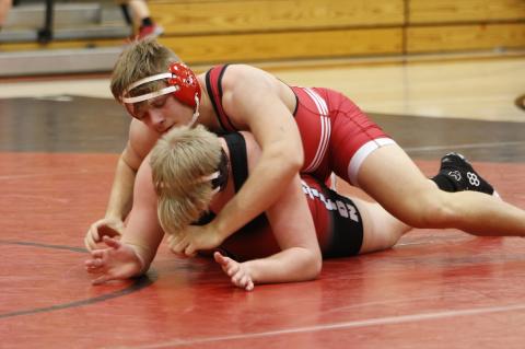 	WRESTLERS HIT THE MAT 
