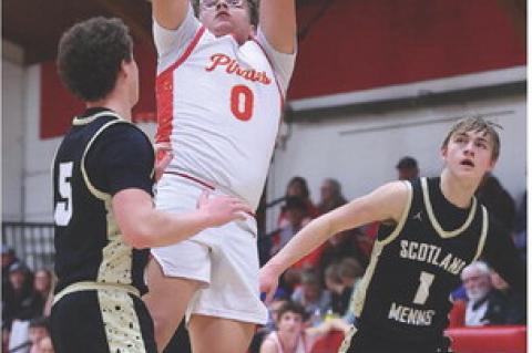 Dominic Doom rises above the Scotland/Menno defense for a two-point attempt during recent Pirate action.