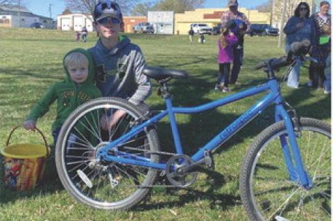Kyson Well was the winner of a bike, pictured with his brother.
