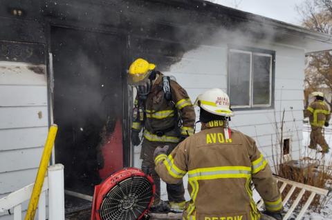 FIREMEN BRAVE THE COLD TO FIGHT MOTEL FIRE