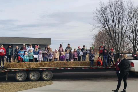 CHRISTMAS CAROLS FILL THE AIR