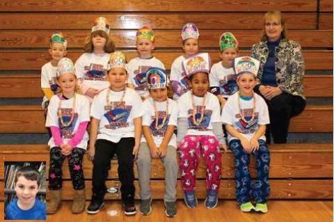 Top readers are pictured with Mrs  . Ersland , Elementary Principal  . Ryder Insko was not present on picture day for the group but wanted to honor his achievement with a headshot  .