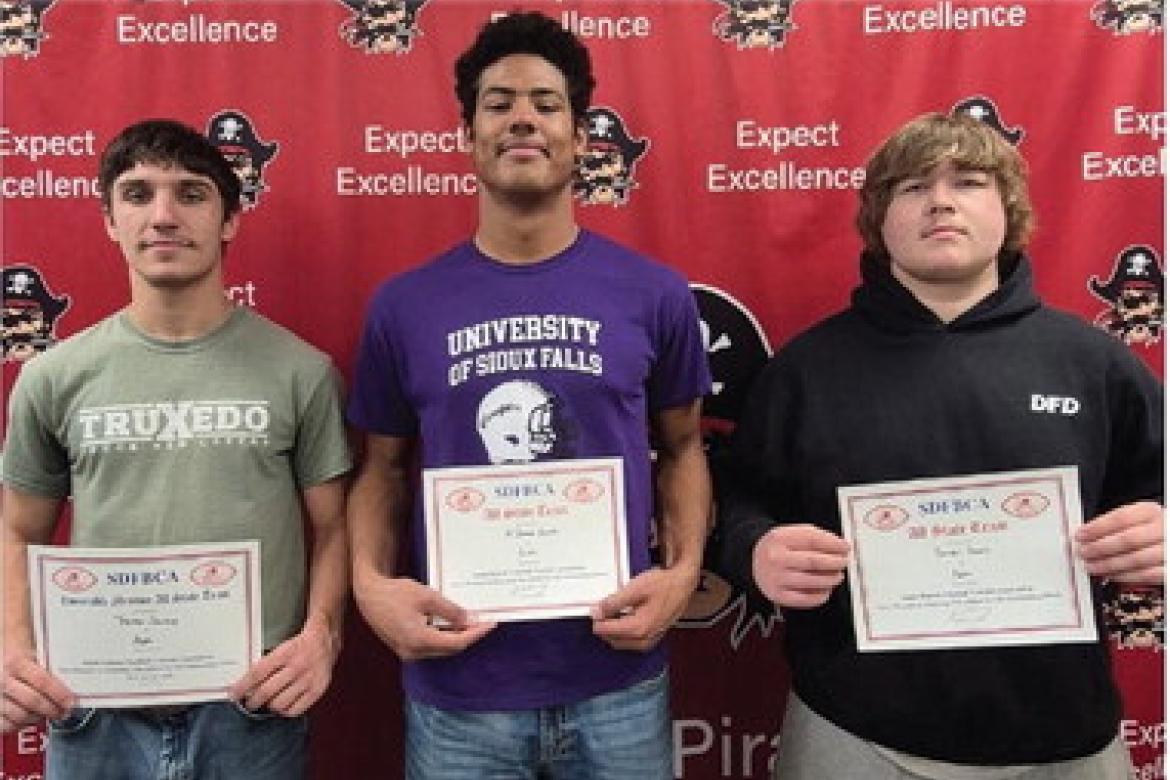 All-State recipients, pictured from left, are: Trenton Soukup - Honorable Mention, Al'Shamon Gunter - Tight End, and Randall Powers - Offensive Line.